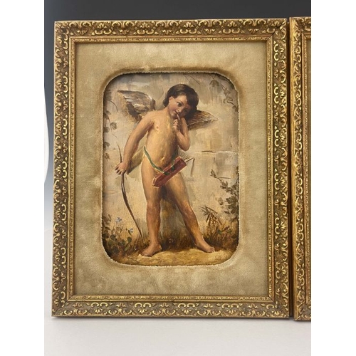 209 - A pair of Goldscheider wall plaques, late 19th Century, each painted with a standing winged cherub, ... 