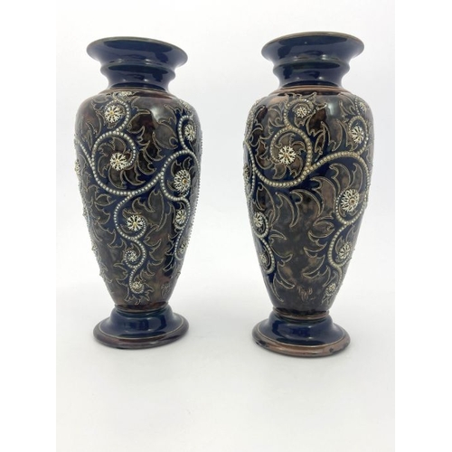 283 - George Tinworth for Royal Doulton, a pair of stoneware vases, circa 1903, footed and shouldered form... 