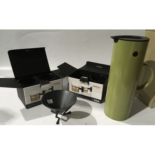 316 - Erik Magnussen for Stelton, a  boxed 1 litre vacuum jug, green plastic, an Alessi black plastic trip... 