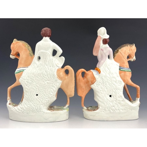 452 - A pair of 19th Century Staffordshire flatback figure groups, Prince and Princess of Wales on horseba... 