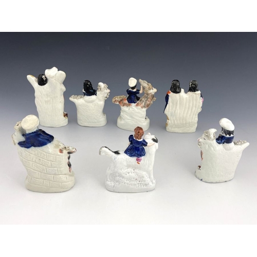 454 - A group of seven 19th Century Staffordshire flatback figure groups, to include four figures of boys ... 