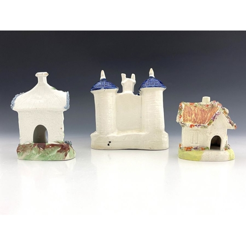 458 - Three 19th Century Staffordshire pottery pastille burners/chimney ornaments, to include a twin turre... 