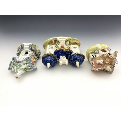 458 - Three 19th Century Staffordshire pottery pastille burners/chimney ornaments, to include a twin turre... 