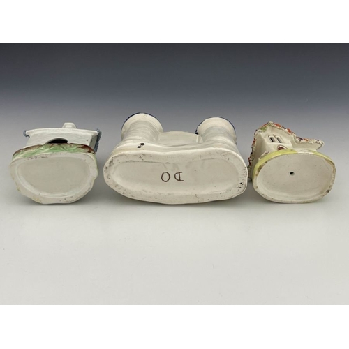 458 - Three 19th Century Staffordshire pottery pastille burners/chimney ornaments, to include a twin turre... 