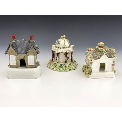 461 - Three 19th Century pastille burners, to include a Leeds Pottery creamware Regency cottage with veran... 