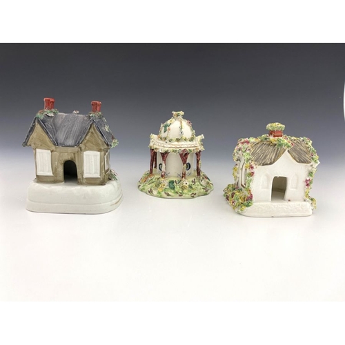 461 - Three 19th Century pastille burners, to include a Leeds Pottery creamware Regency cottage with veran... 