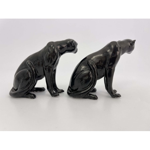 466 - A Royal Worcester pair of figurines, modelled as black panthers, printed marks, 9cm high (2)