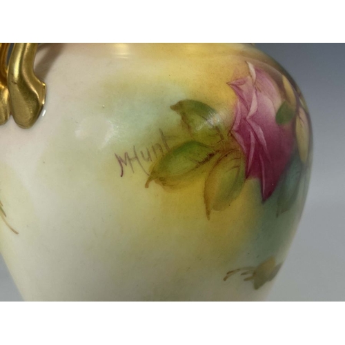 469 - M Hunt for Royal Worcester, a rose painted vase, 1936, shouldered twin handled form, signed, togethe... 