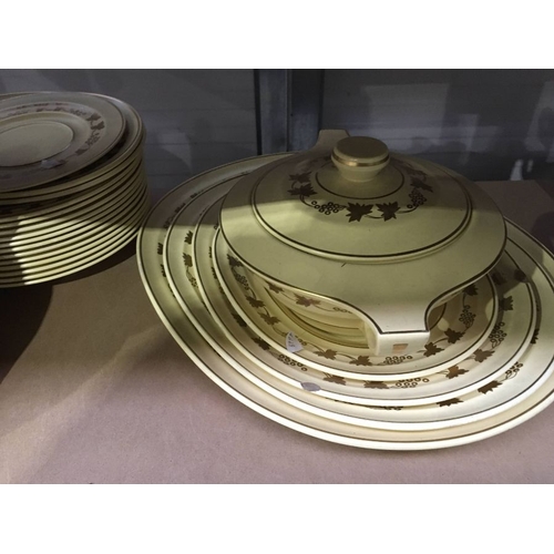 485 - A Wedgwood Etruria Matt Straw dinner service, to include two tureens and covers, twelve dinner plate... 