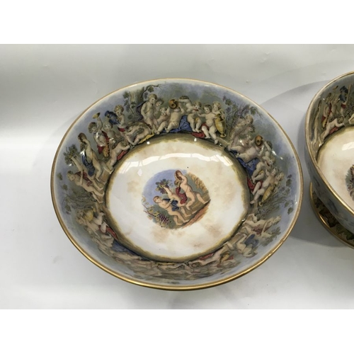 494 - A pair of 19th century Prattware punchbowls, printed polychrome decoration depicting Bacchanalian sc... 