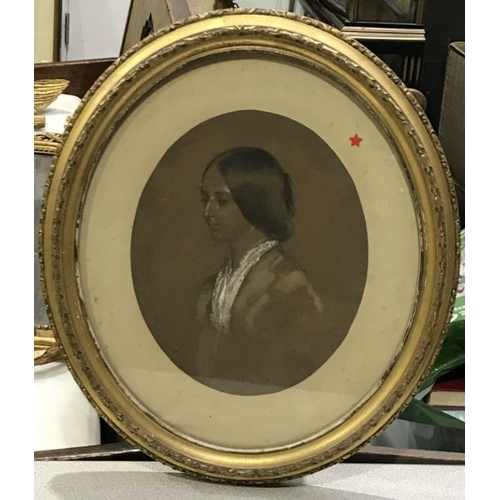 732 - British School, 19th Century, portrait of a young boy, bust length in a brown tunic with lace collar... 