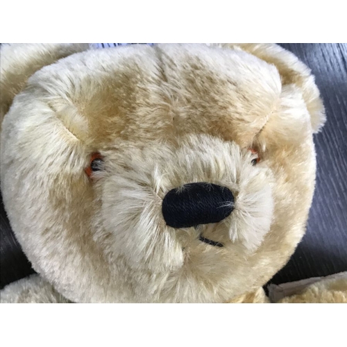 767 - A Chad Valley golden mohair plush growling teddy bear, with brown glass eyes, stitched  black nose, ... 