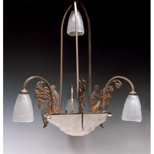 787 - A French Art Deco bronze and glass four branch pendant light, modelled as two seated women holding f... 