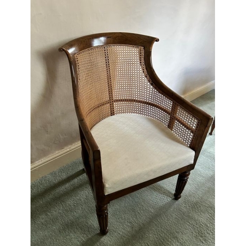 788 - A Regency simulated rosewood library bergere armchair, circa 1820, curved back, upholstered seat, re... 