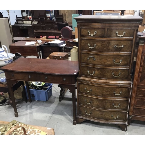 861 - A walnut and crossbanded serpentine chest on chest, fitted two short over three graduated drawers, a... 