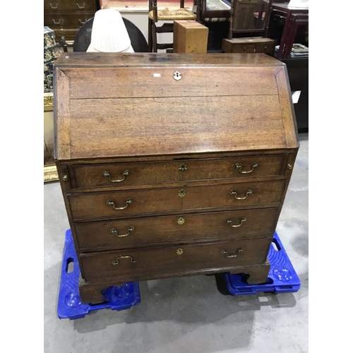 898 - A George III oak bureau, fall front revealing fitted interior, above four graduated drawers fitted b... 