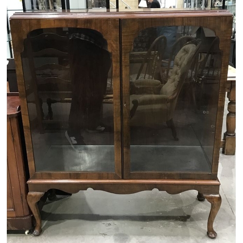 922 - A mahogany vitrine, circa 1930's, moulded top, cabriole legs, pad feet, 132cm high, 106cm wide, 40cm... 