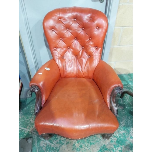 938 - A Victorian walnut balloon back library armchair, circa 1860, crimson red leather button back uphols... 