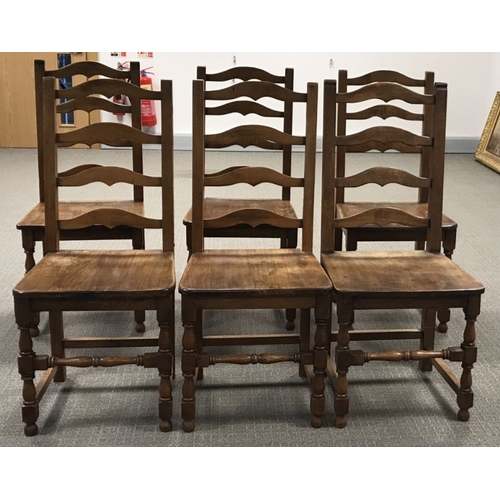 957 - A set of six oak ladder back dining chairs (6)