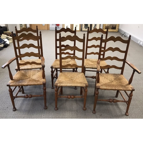 958 - A set of six ladderback rush seated chairs, two carvers and four single  (6)