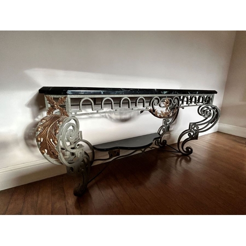 970 - An Italian wrought iron, tole and marble console table of Baroque design, late 19th or early 20th Ce... 