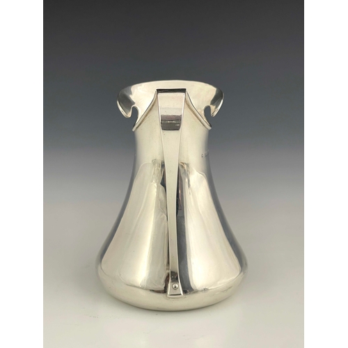 204 - A Jugendstil silver jug, import marks Murrle Bennett and Co., London 1903, splayed baluster form wit... 