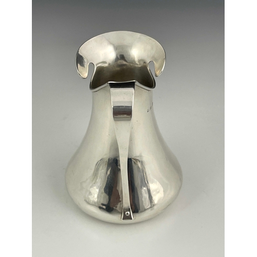 204 - A Jugendstil silver jug, import marks Murrle Bennett and Co., London 1903, splayed baluster form wit... 