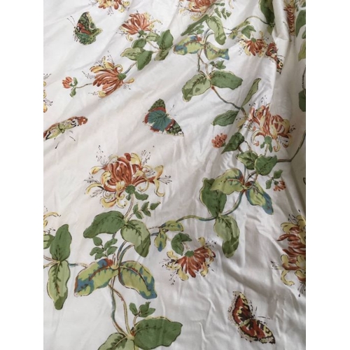 117 - A pair of professionally made glazed cotton curtains, decorated with honeysuckle and butterflies, li... 