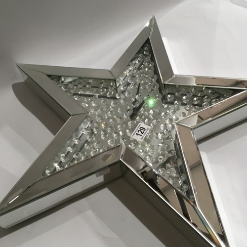 129 - A Julien Macdonald encapsulated crystal mirrored star shape wall clock