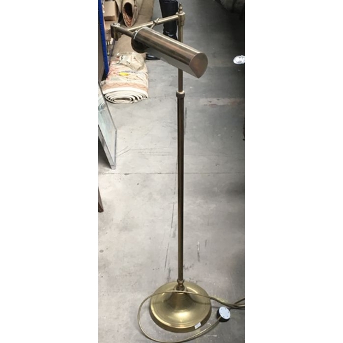 320 - A pair of brass reading standard lamps, and a three tier pot stand (3)