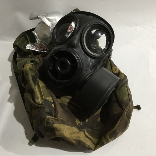 338 - Two gas masks and bags, one stamped Avon 1986 (2)