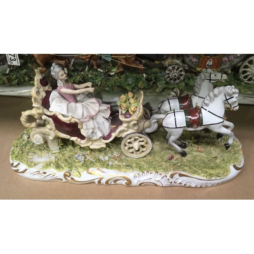 373 - A Capodimonte bisque porcelain model of an open coach and horses, on foliate scroll base, 62cm wide,... 