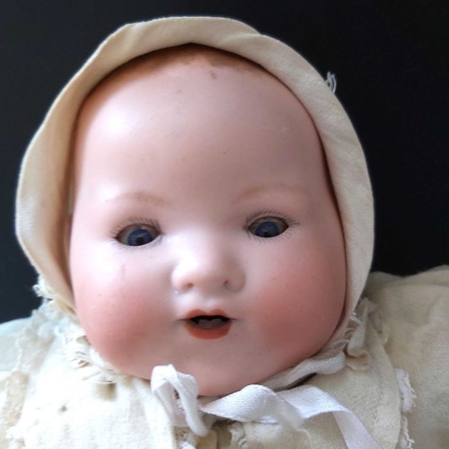 399 - Armand Marseille baby bisque head doll, sleeping blue eyes, painted brows and lashes, painted open m... 