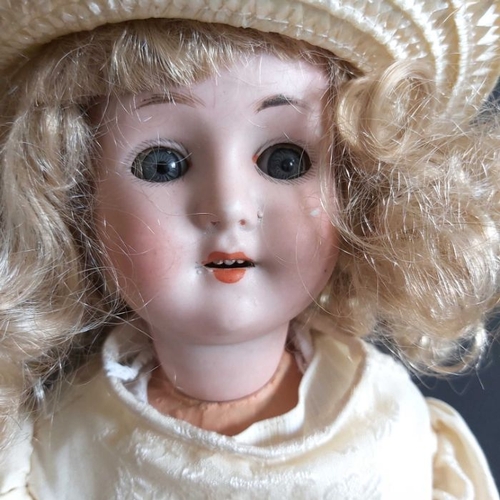 401 - Welsch & Co bisque head doll, sleeping blue eyes, painted open mouth and exposed teeth, composite jo... 