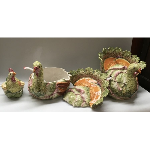 416 - A pair of Italian porcelain soup tureens and covers modelled as vegetable formed turkeys, and a pair... 