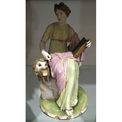 455 - Ernst Wahliss, a Vienna porcelain figure of Thalia (Talia), modelled as the Greek muse sitting on a ... 