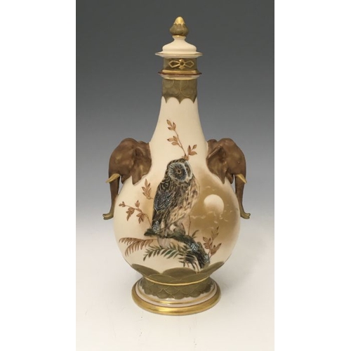 459 - A Continental Aesthetic Movement vase and cover, twin handled bottle form with elephant handles and ... 