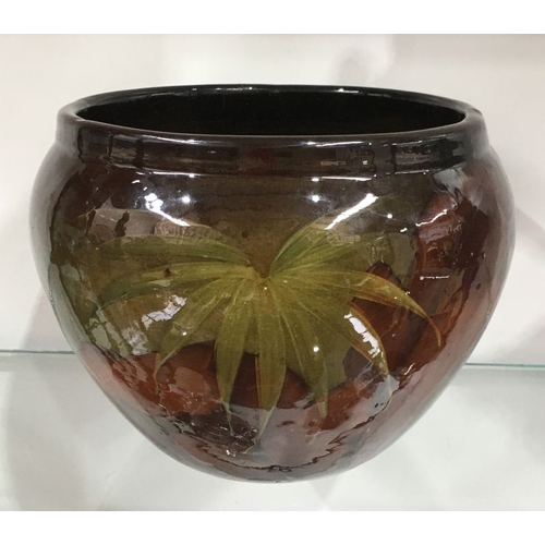 463 - An American Weller art pottery jardiniere, painted with ferns, 17cm high