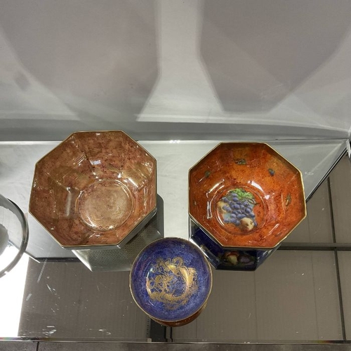 492 - Three Wedgwood lustre bowls, two octagonal including fish, dragon and fruit examples, 23cm diameter ... 