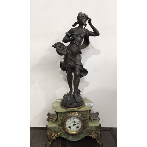 572 - Auguste Moreau, and Art Nouveau gilt and onyx mantel clock, mounted with patinated art metal figure ... 