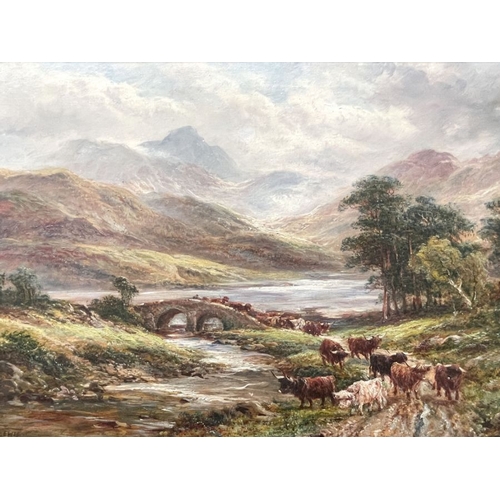 665 - A...Lewis (British, early 20th Century), Highland landscape with cattle crossing a bridge, signed l.... 