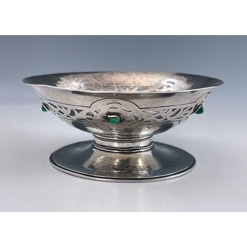 114 - An Arts and Crafts gem set bowl, probably Artificers Guild circa 1915, reticulated footed form, the ... 