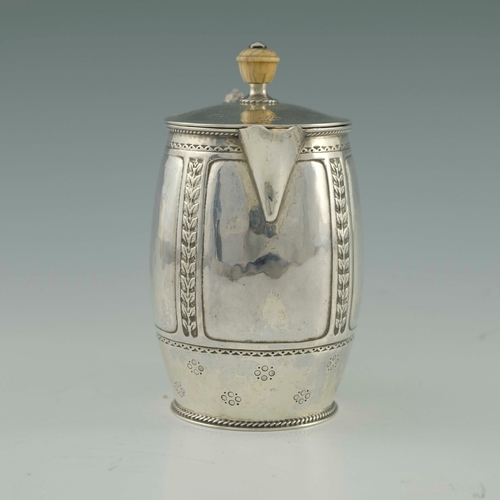 118 - Bernard Cuzner for Liberty and Co., an Arts and Crafts silver lidded jug, Birmingham 1919, barrel fo... 