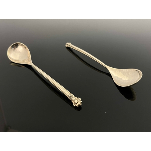 126 - Omar Ramsden, a pair of Arts and Crafts silver spoons, London 1925, planished, with cruciform sectio... 