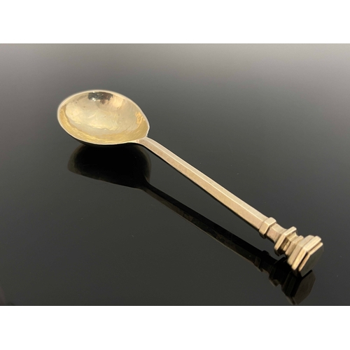 129 - Omar Ramsden, an Arts and Crafts silver seal top spoon, London 1938, hexagonal section tapered stem ... 