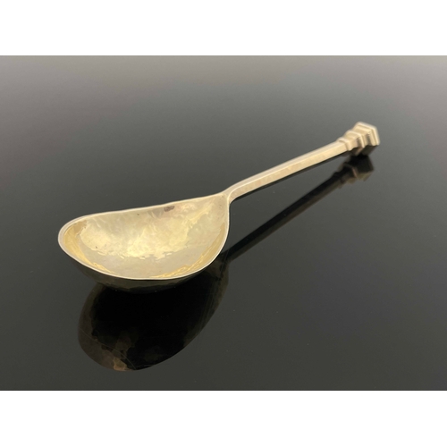 129 - Omar Ramsden, an Arts and Crafts silver seal top spoon, London 1938, hexagonal section tapered stem ... 