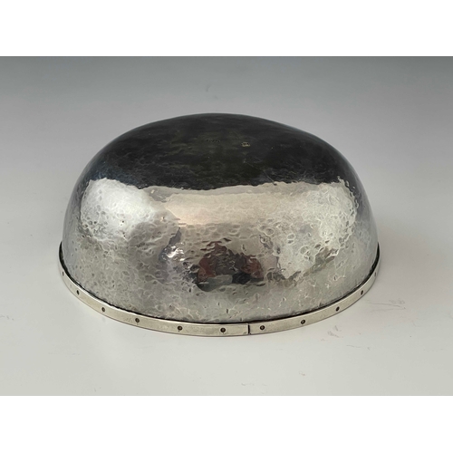 133 - An Arts and Crafts silver bowl, Adrian Harlaar, planished rounded form, applied with a rivet studded... 