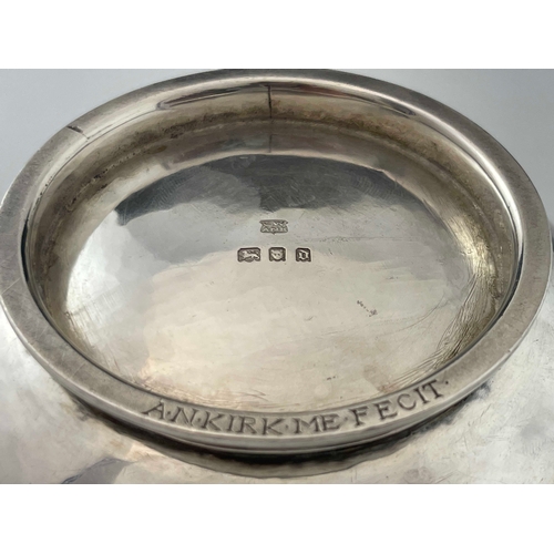 135 - An Arts and Crafts silver bowl, Charles Welch and Arthur Nevill Kirk, London 1919, planished and foo... 