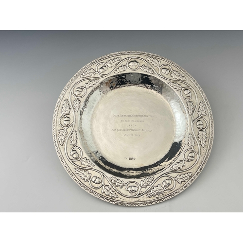 136 - An Arts and Crafts silver broad rimmed dish, Philip Frederick Alexander, London 1912, planished and ... 