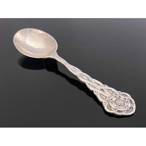 143 - An Arts and Crafts silver spoon, George Payne and Son, London 1907, planished and cast with knotted ... 